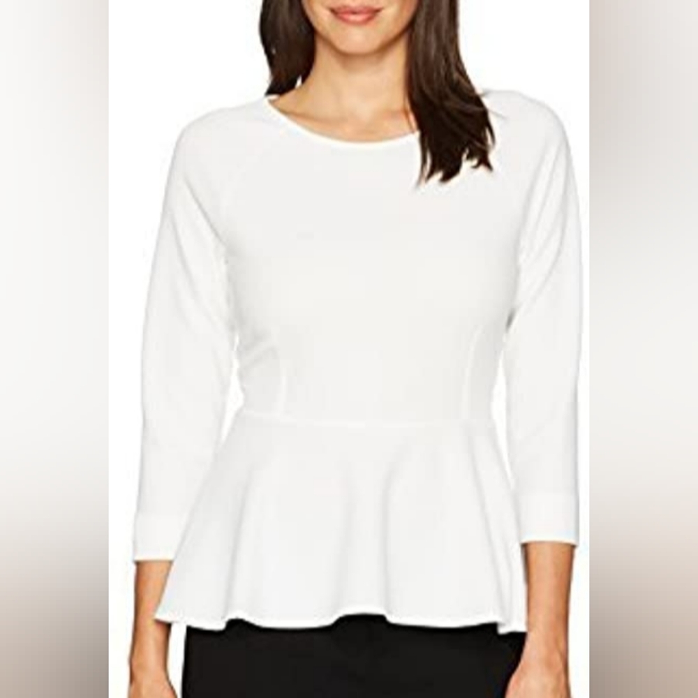 White peplum top